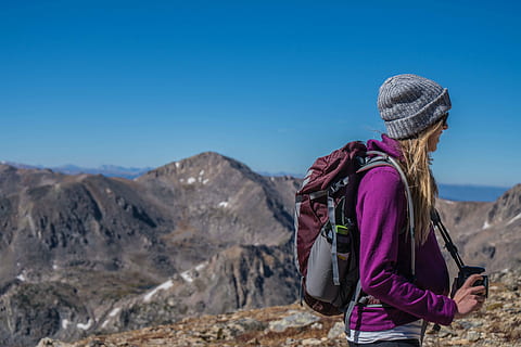 girl hiking in mountains